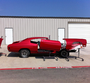 car being put together after custom paint job