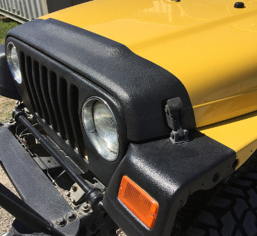 Jeep with protective coating on front