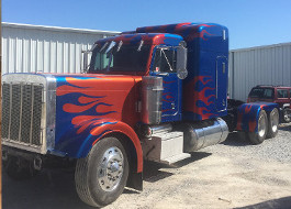 custom flame paint job on semi truck